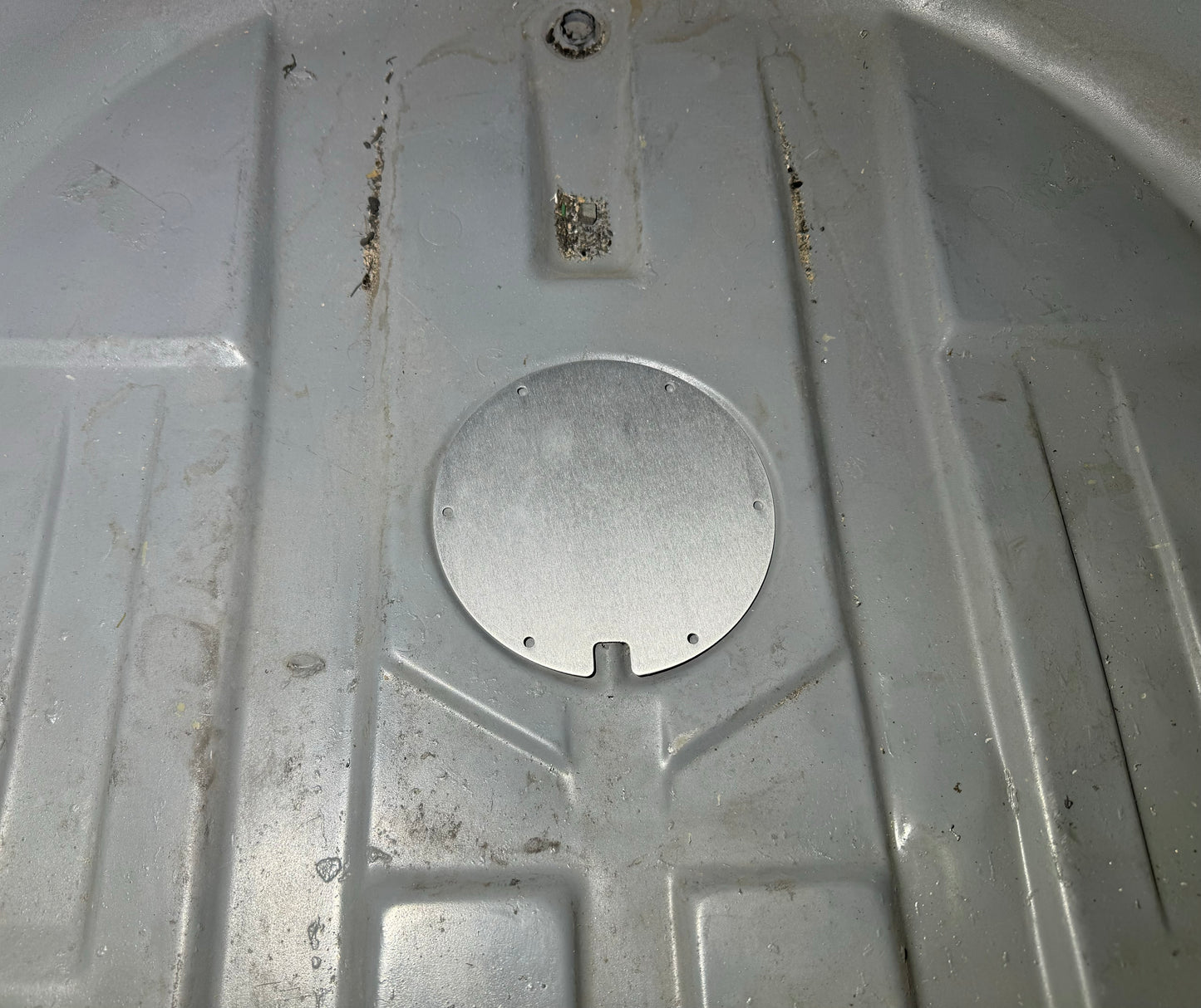 E46 spare tire well block off plate